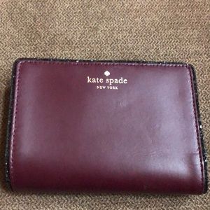 Burgundy Kate Spade wallet.